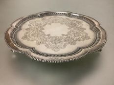 A late Victorian silver salver, Martin Hall & Co., Sheffield 1895, of circular form, with beaded