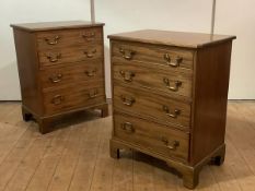A pair of small George III style mahogany chests, 19th century, each with rectangular top and