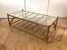 A modern birch coffee table by William Yeoward, the rectangular glass top on a conforming frame