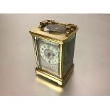 A handsome French 19th century brass-cased carriage clock, the eight day movement striking the