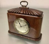 A French walnut-cased mantel clock, early 20th century, of caddy form, the case with domed reeded