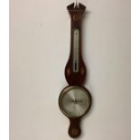 A George IV inlaid mahogany wheel barometer, c. 1820, signed on the engraved and silvered dial "