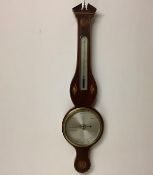 A George IV inlaid mahogany wheel barometer, c. 1820, signed on the engraved and silvered dial "