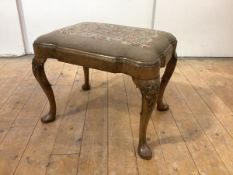 A George I style walnut stool, 1st quarter 20th century, the rectangular frame with serpentine