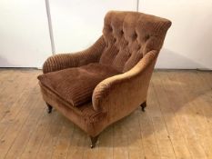 An easy armchair attributed to Whytock & Reid, with deep seat and buttoned back enclosed by