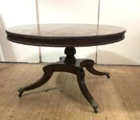 A Scottish Regency rosewood centre table, in the manner of William Trotter, the circular top with