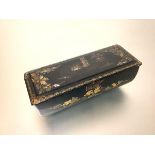 An English papier mache box, third quarter of the 19th century, of tapering rectangular form, the