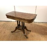 A Scottish Regency mahogany and ebony lined card table, the rectangular foldover top above an inlaid