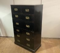 A late 19th century ebonised campaign style chest, of two short and five long drawers, with recessed