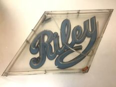 A vintage large neon advertising sign for Riley Cars, in a lozenge-shaped frame (a/f). 59cm by