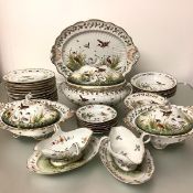 A striking porcelain dinner service in the Swan pattern, late 19th century, probably Capodimonte,