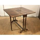 A mid-19th century figured walnut Sutherland table, the rectangular top with twin drop leaves on