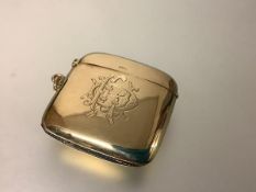 An Edwardian 9ct gold vesta case, Henry Griffith & Sons Ltd., Chester 1902, of characteristic