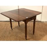 A mid-19th century mahogany Pembroke table, the rectangular top with moulded edge and twin drop