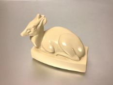 John Skeaping for Wedgwood, a model of a duiker, the faun modelled seated on a shaped rectangular