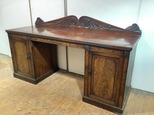 A fine Regency mahogany sideboard, in the manner of William Trotter, c. 1820, the raised back