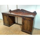 A fine Regency mahogany sideboard, in the manner of William Trotter, c. 1820, the raised back