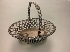 A George II silver swing-handled sweetmeat basket, London 1755, possibly Samuel Herbert & Co (