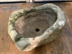 A Scottish carved stone trough planter, of shaped rectangular form, drilled for drainage. 50cm by
