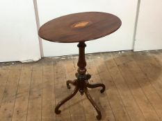 A mid-19th century mahogany occasional table, the oval top with later conch shell inlay, on a turned