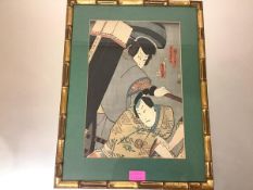 A Japanese woodblock print, probably Meiji period, possibly Kunisada, depicting two warriors, in a