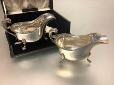 A cased pair of George V silver sauce boats, Barker Brothers Silver Ltd., Birmingham 1934, in 18th