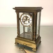 A French four-glass gilt-bronze mantel clock 19th century, the case of architectural form, with