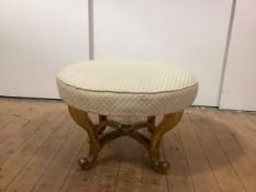 A late 19th century giltwood centre stool, the circular seat upholstered in a cream lattice