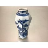 A small Chinese blue and white porcelain baluster vase, possibly 18th century, of faceted form,