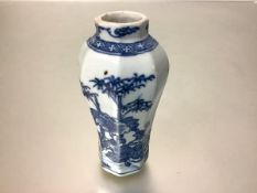 A small Chinese blue and white porcelain baluster vase, possibly 18th century, of faceted form,