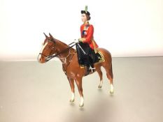 A Beswick model of H.M. The Queen mounted on Imperial at Trooping the Colour 1957, model no. 1546.