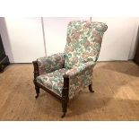 A Scottish Regency mahogany library armchair, the upholstered back, and seat enclosed by arms with