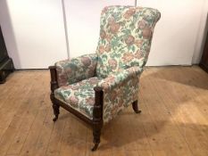 A Scottish Regency mahogany library armchair, the upholstered back, and seat enclosed by arms with