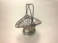 A George V silver sweetmeat basket, Levi & Salaman, Birmingham, 1912, with bifurcated handle and