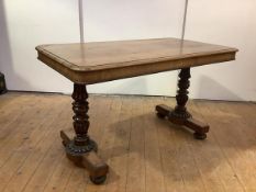 A George IV rosewood writing table, attributed to Gillows, the rectangular top with rounded