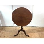 A good George III mahogany bird cage tripod table, c. 1750, the one-piece circular top over a vase-