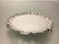 Asprey & Co., a George V silver waiter of 18th century design, Sheffield 1913, circular, with