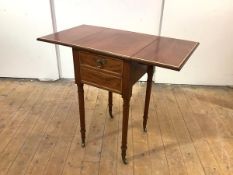 A Regency mahogany and boxwood-banded pot cupboard, the rectangular top with twin hinged flaps,