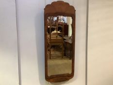 A George II style mahogany pier glass in the manner of Whytock & Reid, with fret carved crest and