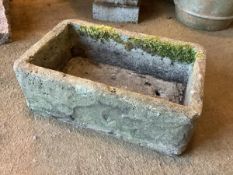 A weathered sandstone garden trough, of rectangular form. 22cm by 36cm by 58cm