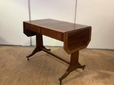 A fine Scottish Regency mahogany and pollard oak-banded sofa table, the rectangular top