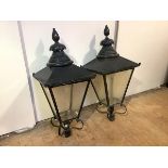 A pair of large black-painted metal street lanterns, possibly Edinburgh gas lamps, of tapering
