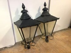 A pair of large black-painted metal street lanterns, possibly Edinburgh gas lamps, of tapering