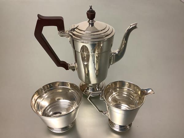 A George V silver three piece bachelor's coffee service, Fenton Russell & Co. Ltd, Birmingham 1930