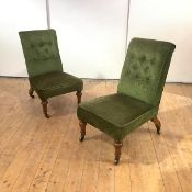 A pair of mid-19th century walnut low chairs, each with button-upholstered back and padded seat,