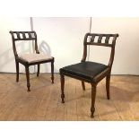 A pair of Scottish Regency mahogany and ebonised side chairs in the Grecian taste, the scrolling