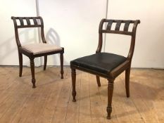 A pair of Scottish Regency mahogany and ebonised side chairs in the Grecian taste, the scrolling