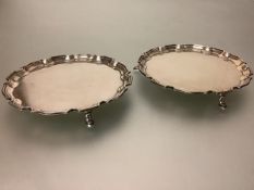 A pair of George V small silver salvers, Alexander Scott, Birmingham 1935, in the Georgian taste,