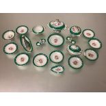 A late 19th century doll's or childrens' porcelain dinner service each piece decorated with a floral