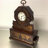 An early 19th century brass-inlaid rosewood mantel clock, the 4" white enamel dial with Roman